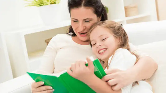 Children reading books at home while parents browse children’s books online in India