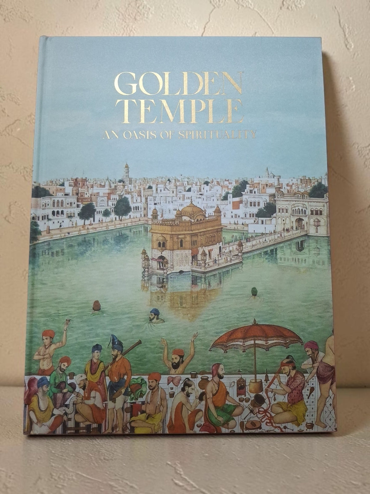 Books and You Golden Temple An Oasis of Spirituality coffee table book featuring an illustrated cover of the temple.