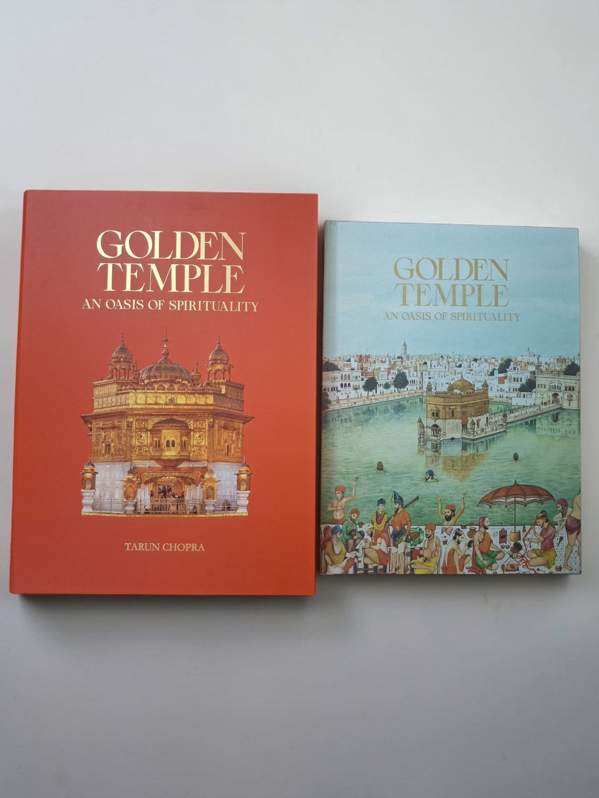 Books and You Golden Temple An Oasis of Spirituality coffee-table book set featuring red and illustrated covers.
