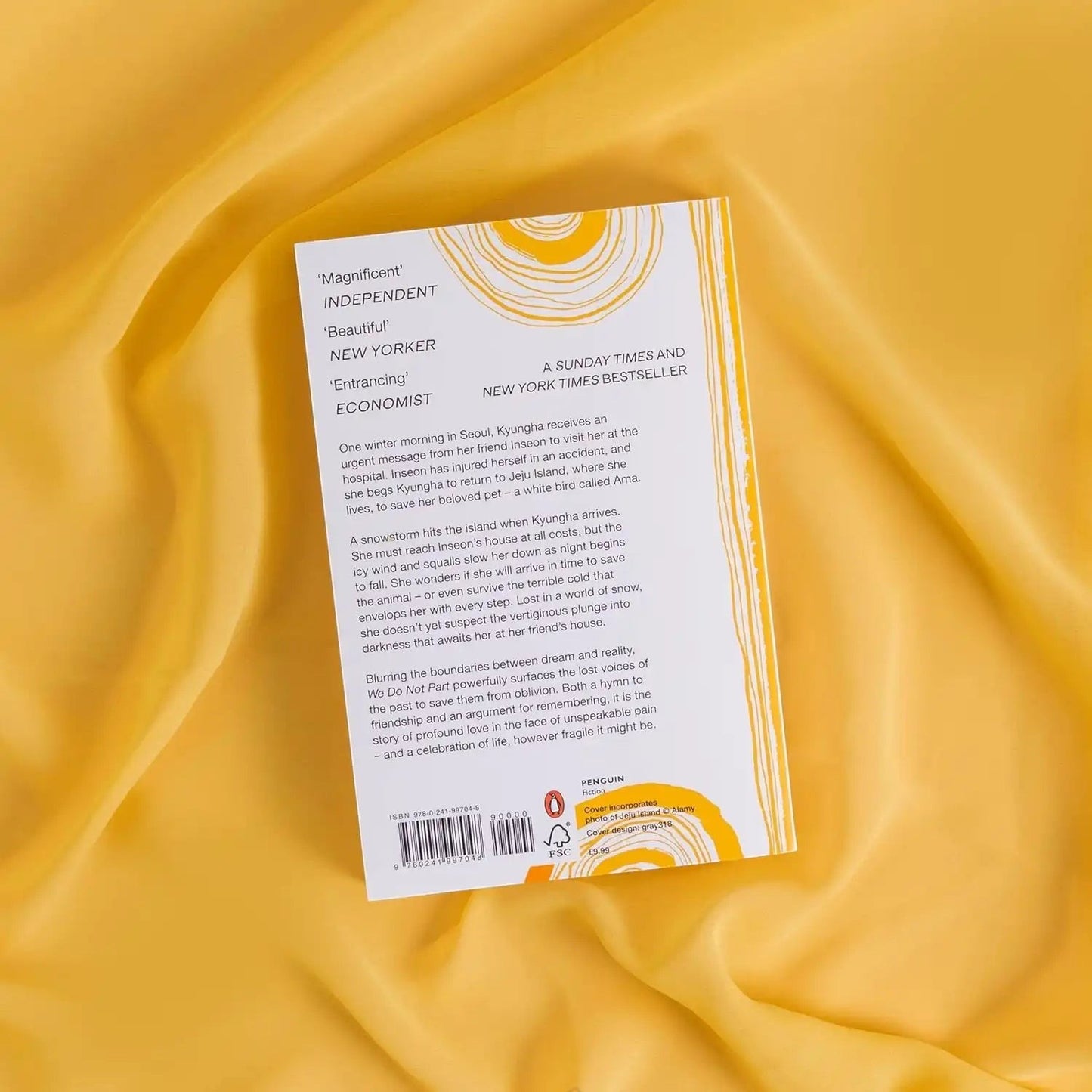Back cover of We Do Not Part by Han Kang, a Books and You paperback novel with yellow fabric background.