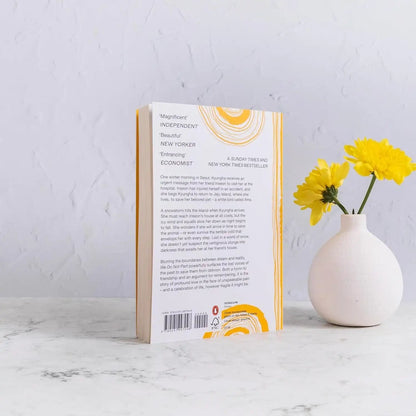 Books and You paperback edition of We Do Not Part by Han Kang, showing the back cover with yellow circular graphics.